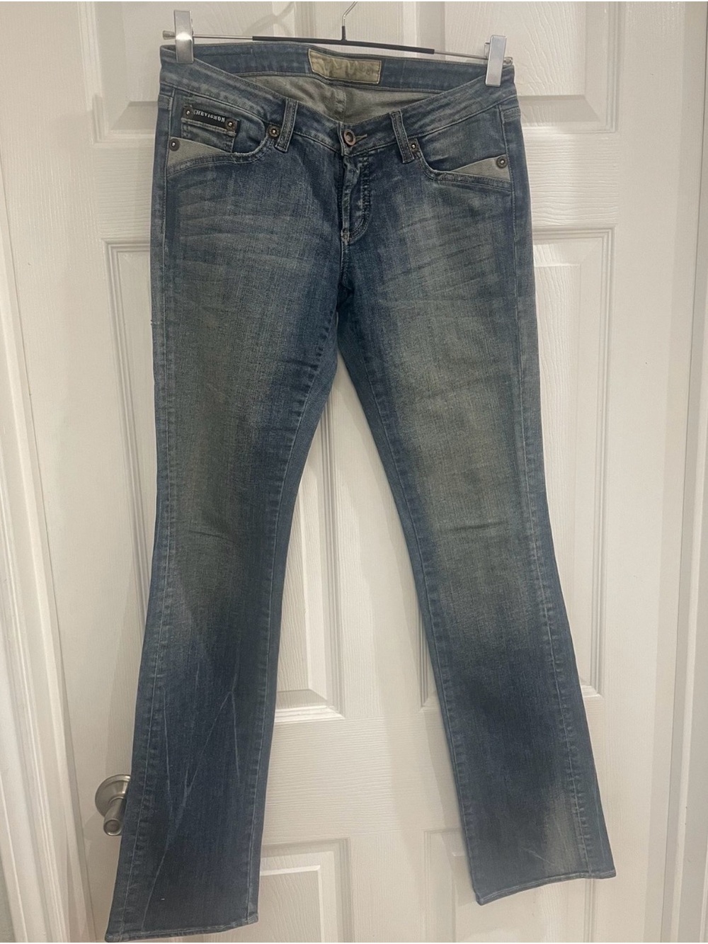 Women's Flared Denim Jeans in Washed Blue